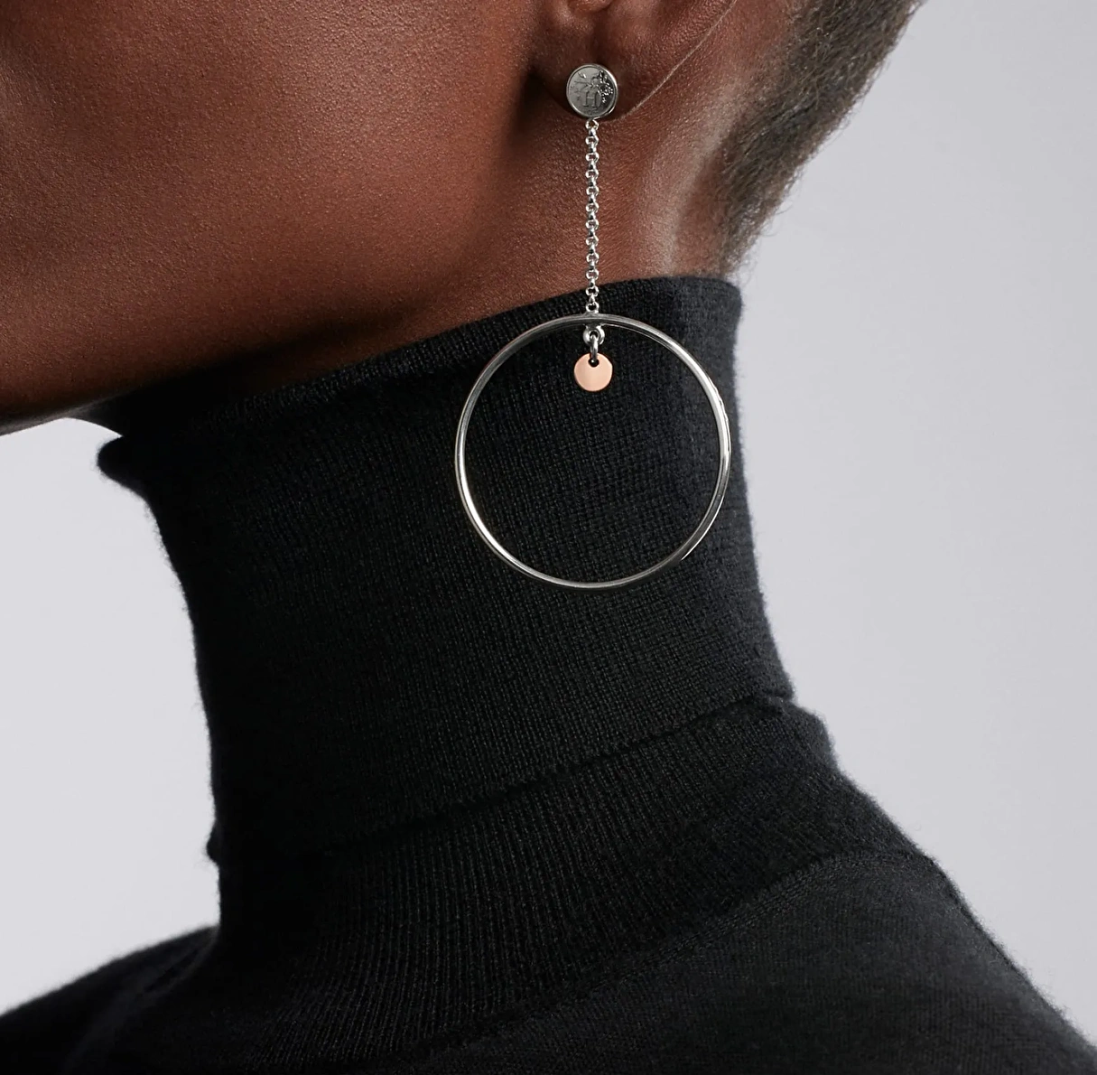 Earring from a jewelry brand, showcasing its elegant design and high-quality materials.
